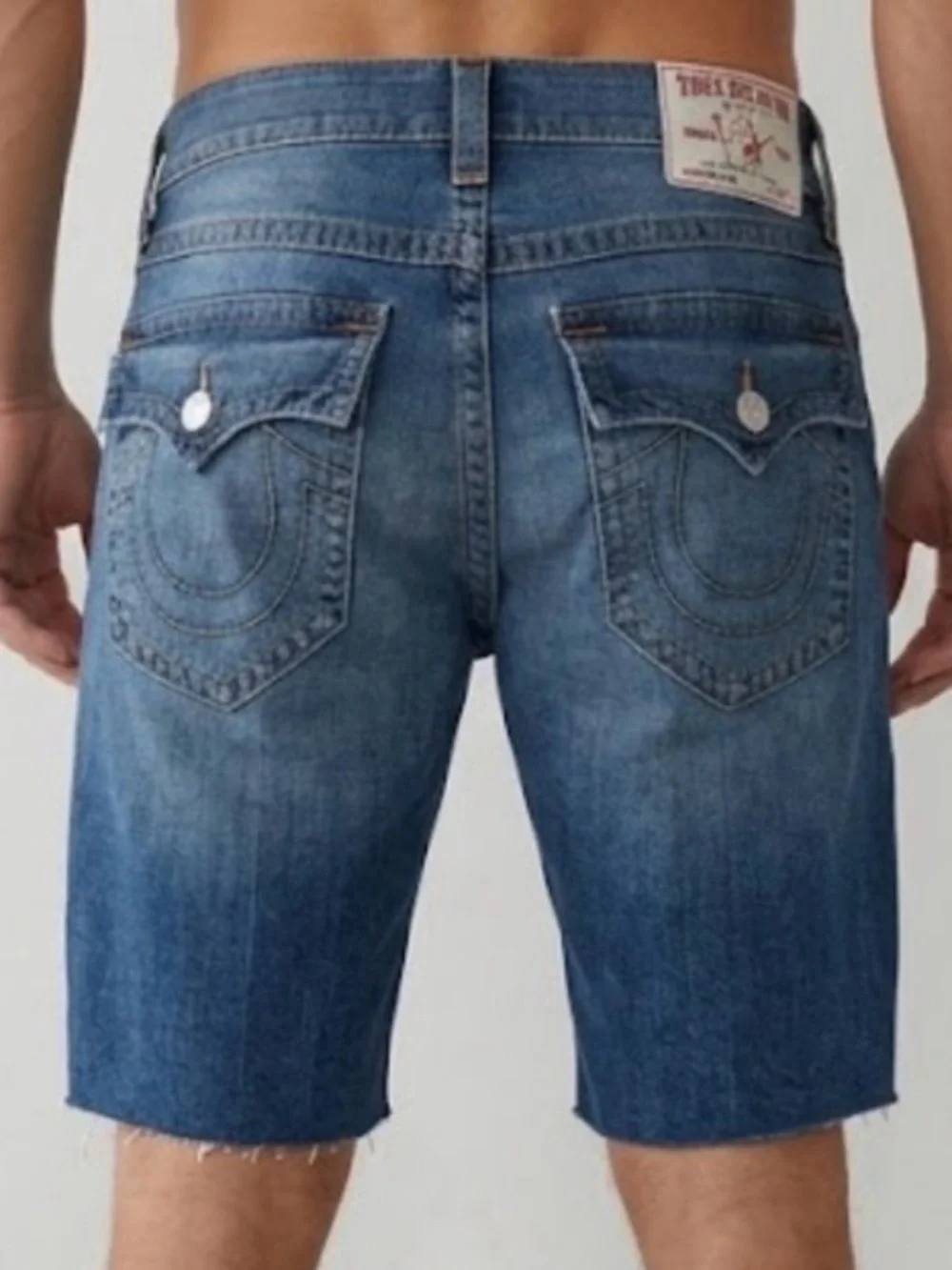 True Religion contrast denim shorts, distressed blue wash and raw, frayed hem 38